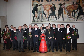Alle Preisträger (FSU Jena, HKI, TU Ilmenau und MetraLabs), Laudationes, Minsister Christoph Matschie, Rektor der Uni Jena Prof. Klaus Dicke und Shopping-Roboter.